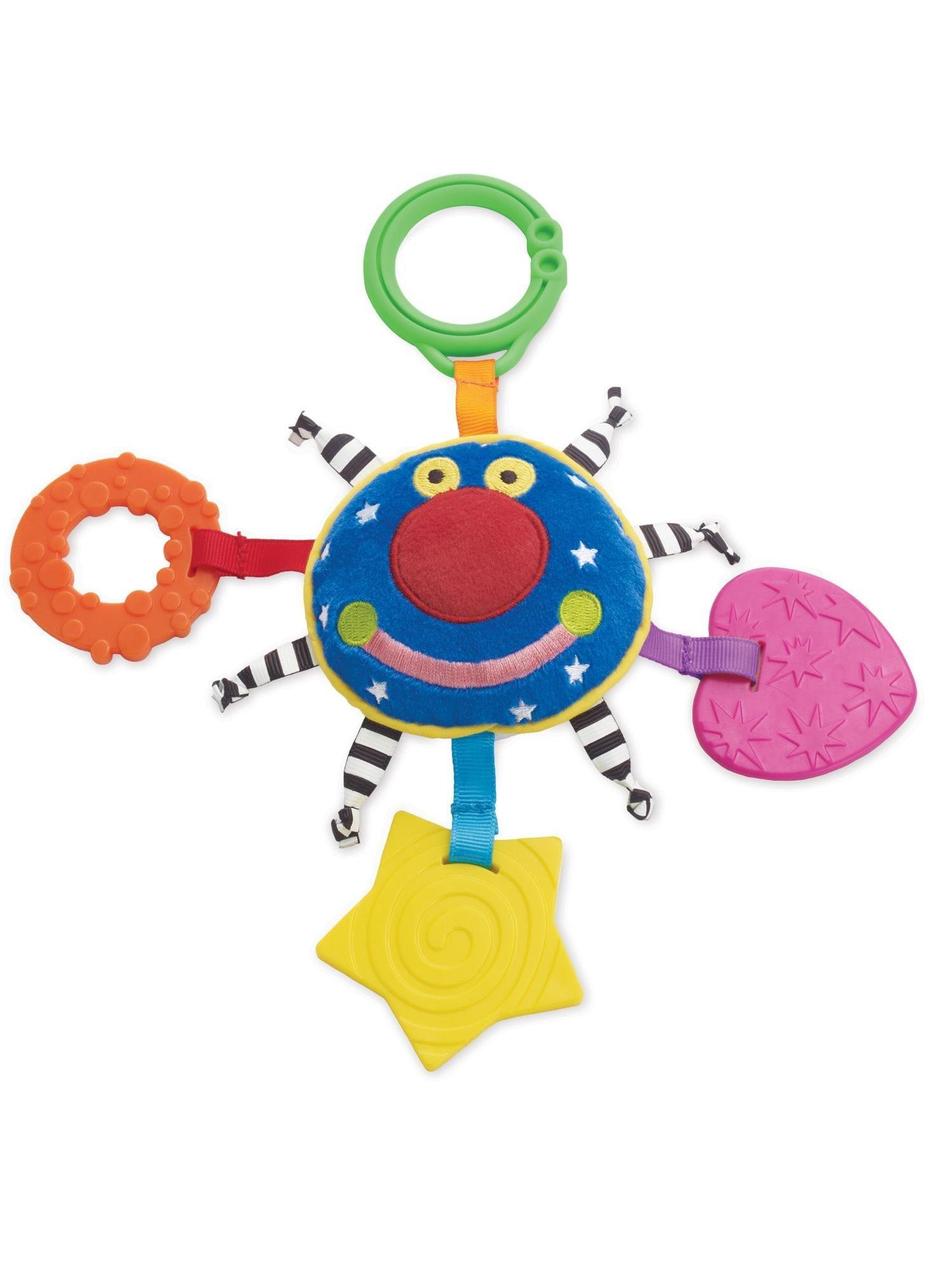 Farvestrålende stofbamse med broderet ansigt, sort-hvide mønstrede bånd og bidedele i plast og gummi
